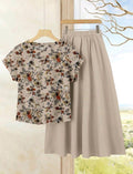 Conjunto de 2 piezas de falda unicolor + blusa con estampado floral.