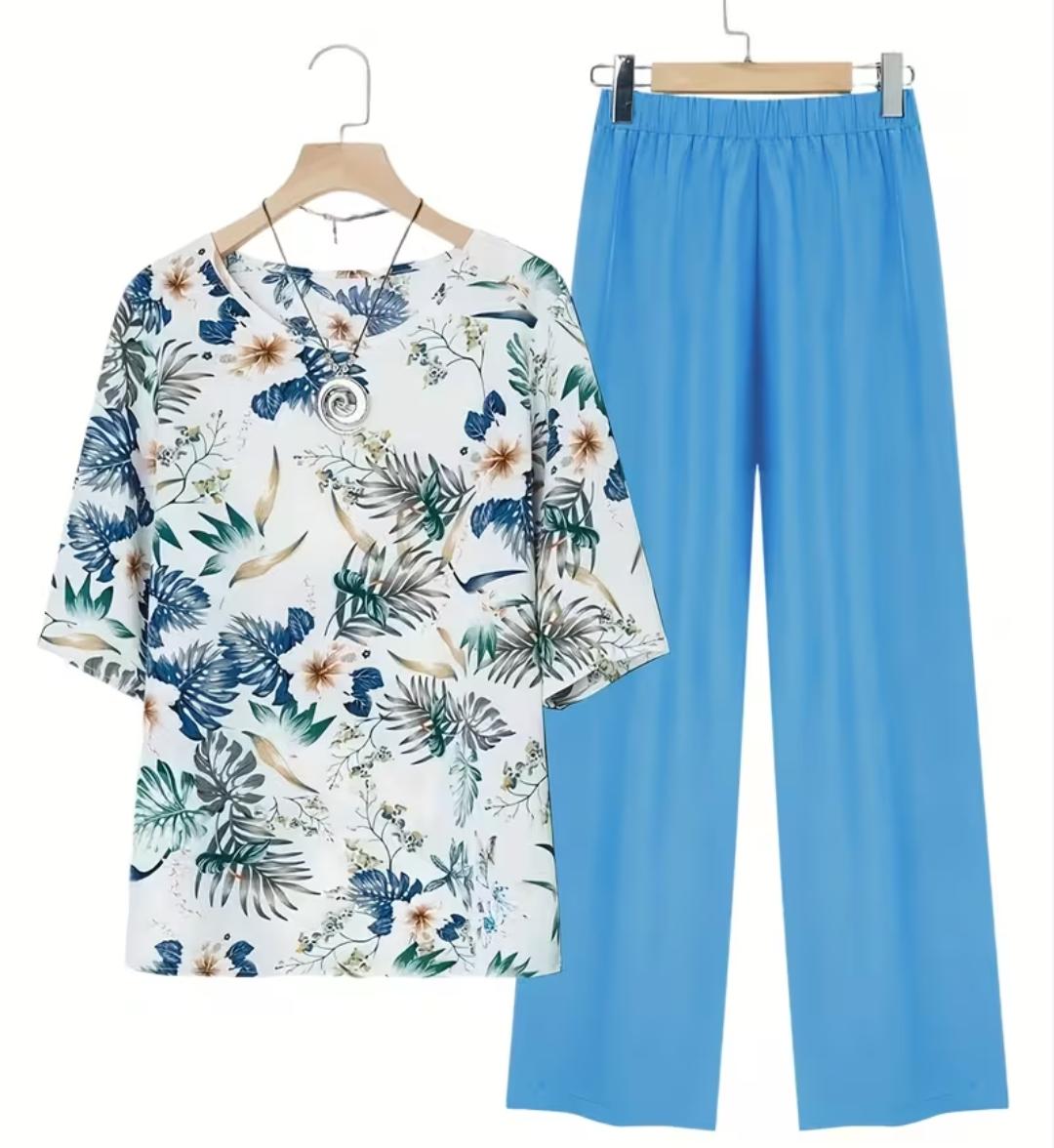 Conjunto de 2 piezas de pantalón y blusa con estampado floral.