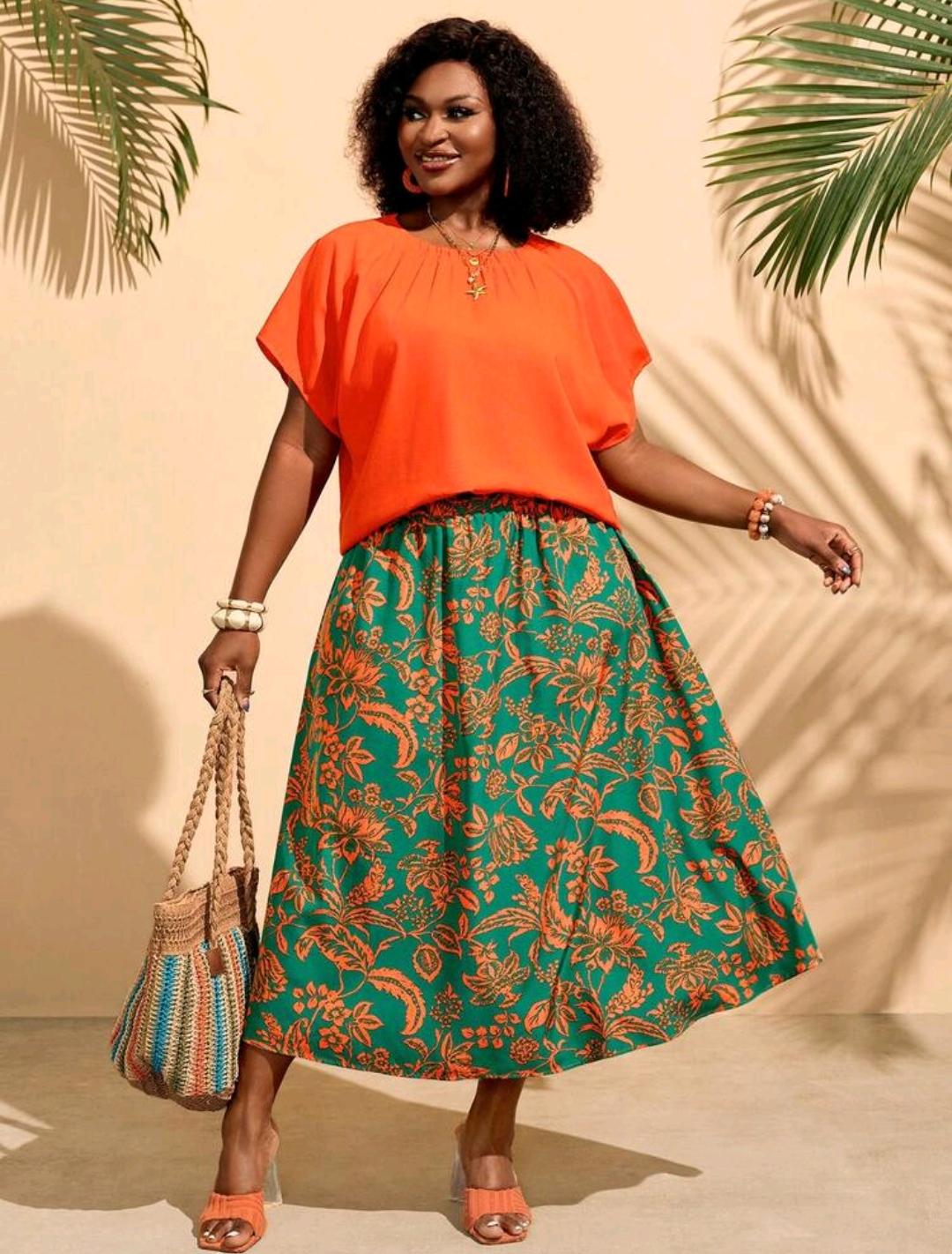 Conjunto de 2 piezas para mujer talla grande: top de manga corta con cuello redondo de color liso y falda con estampado integral, para verano, playa y oficina, en naranja quemado y verde esmeralda