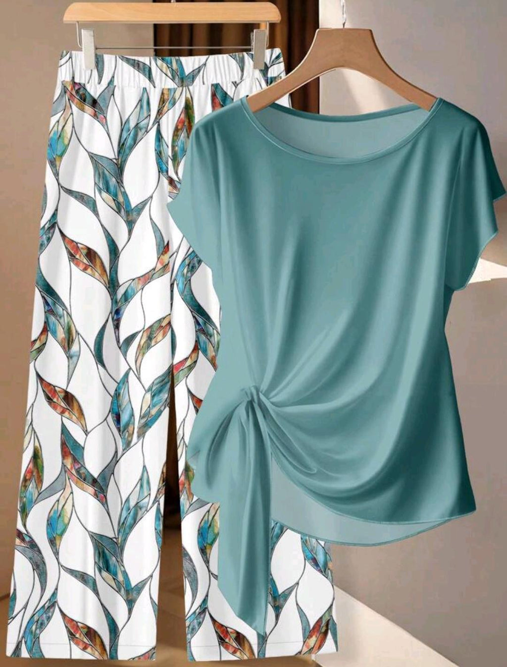 Conjunto de 2 piezas de blusa con lazo minimalista casual y pantalones rectos sueltos con estampado geométrico.