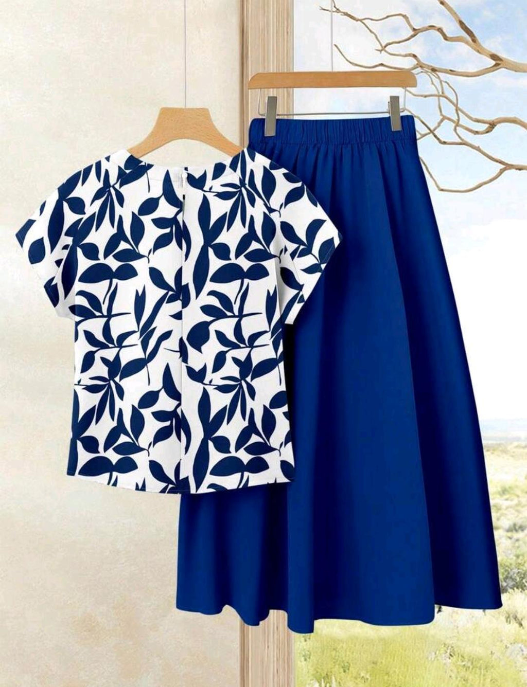 Set de 2 piezas: Blusa de manga corta con estampado de silueta de hojas y falda larga azul sólida a juego, conjunto de vestir de verano para vacaciones.