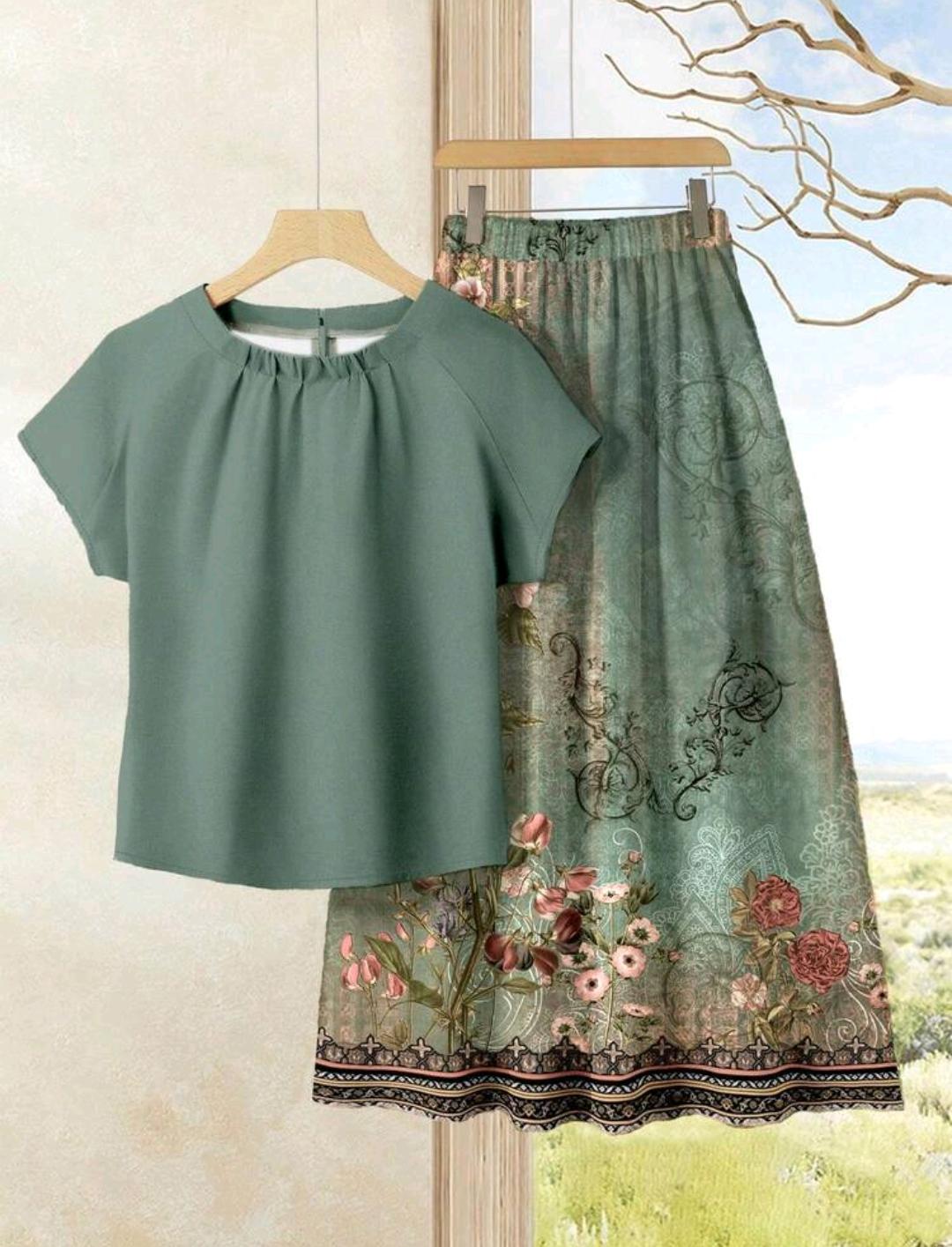 Rusticease Conjunto de 2 piezas de talla grande con blusa unicolor casual y falda con estampado floral.