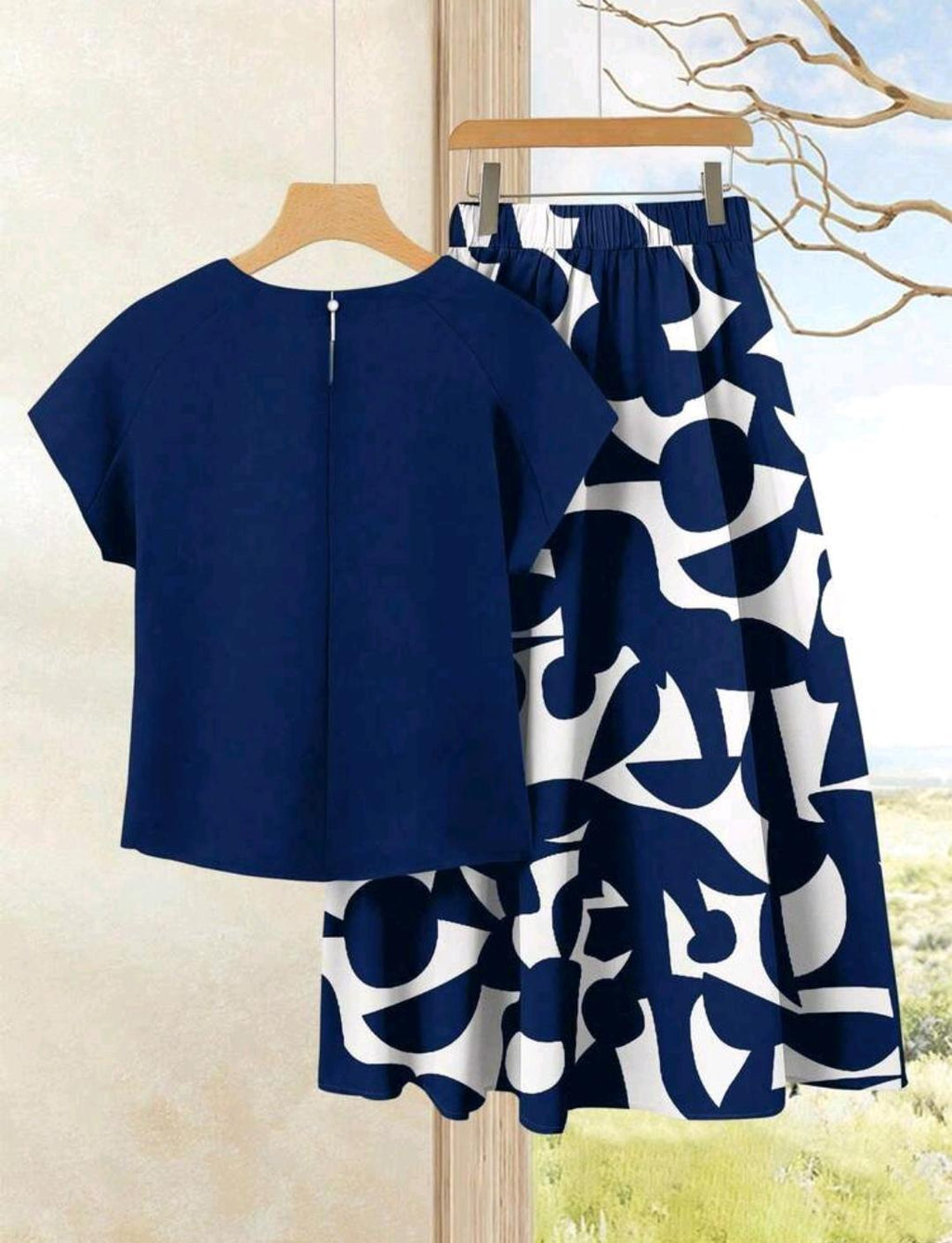 2 piezas Conjunto de top casual de unicolor + falda estampada para vacaciones, ropa de verano para mujer.