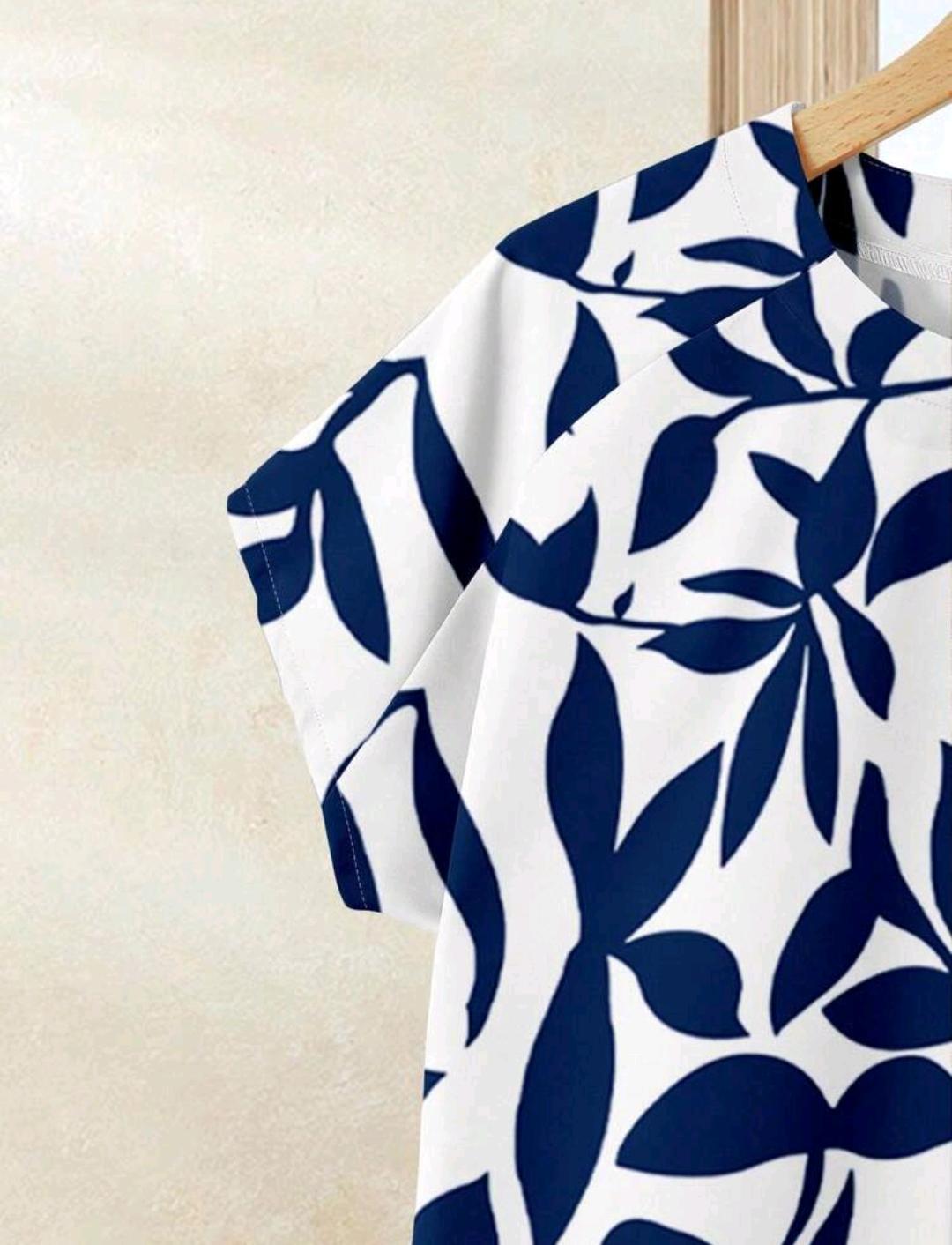 Set de 2 piezas: Blusa de manga corta con estampado de silueta de hojas y falda larga azul sólida a juego, conjunto de vestir de verano para vacaciones.