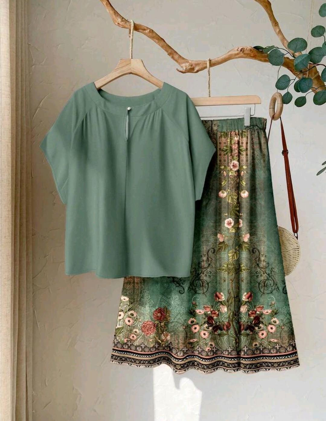 Rusticease Conjunto de 2 piezas de talla grande con blusa unicolor casual y falda con estampado floral.