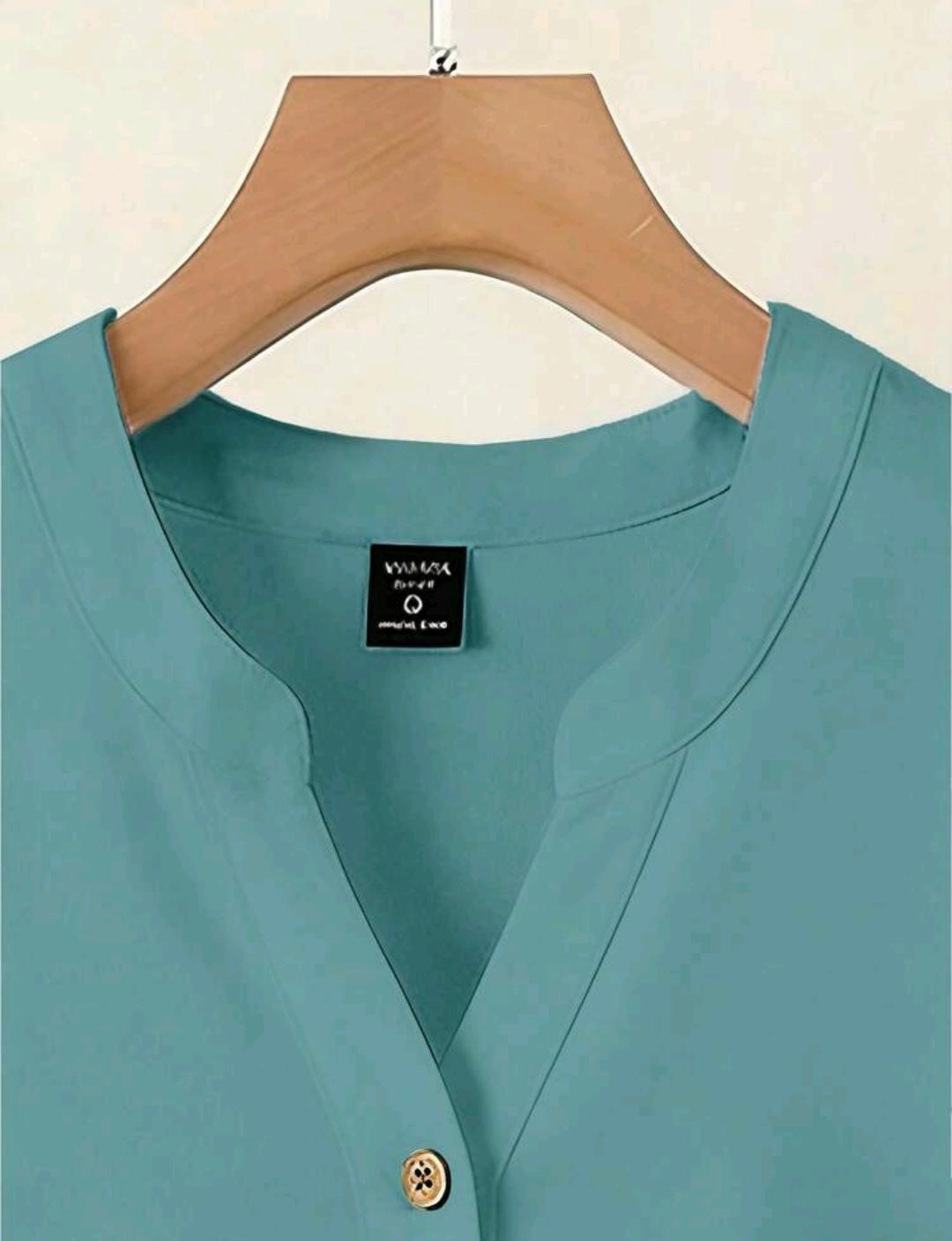 2 piezas, blusa azul-verde combinada con pantalon estampado con un patrón floral geométrico vibrante, adecuado para mujeres de talla grande