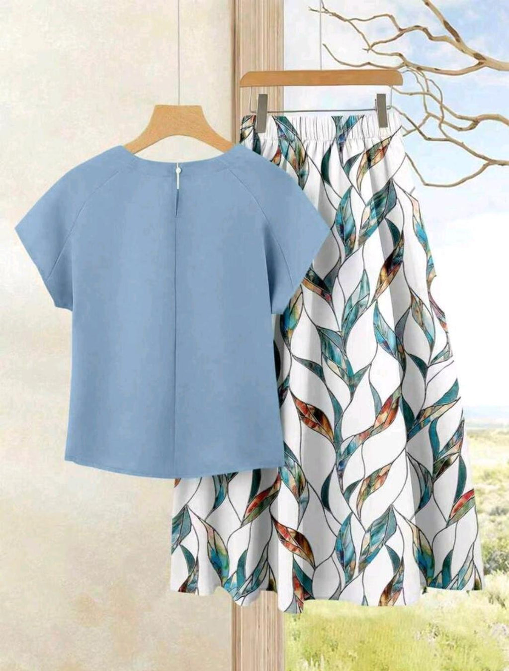 2 piezas Conjunto de falta estampada y blusa unicolor.
