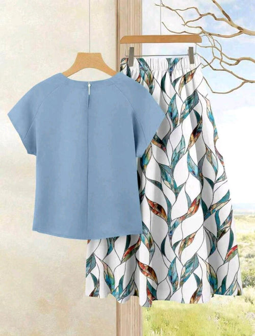 2 piezas Conjunto de falta estampada y blusa unicolor.
