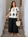 Conjunto de 2 piezas de pantalón y blusa.