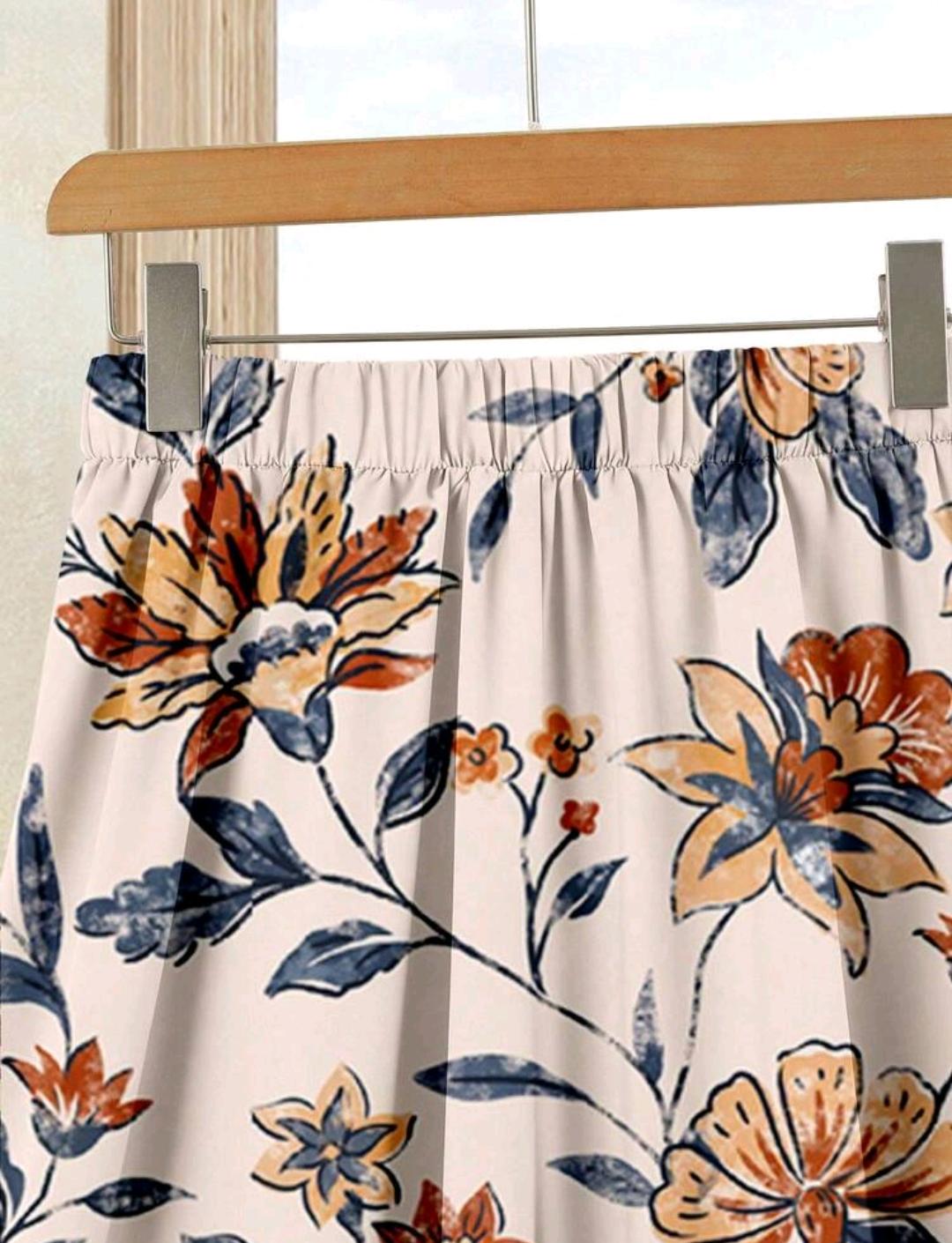 Rusticease Set de 2 piezas de top de color sólido + falda estampada para vacaciones casuales de mujer, conjunto de verano ideal para primavera y verano.