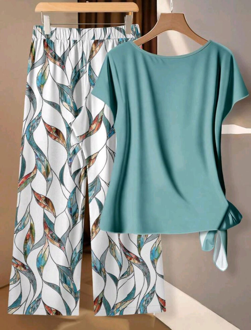 Conjunto de 2 piezas de blusa con lazo minimalista casual y pantalones rectos sueltos con estampado geométrico.