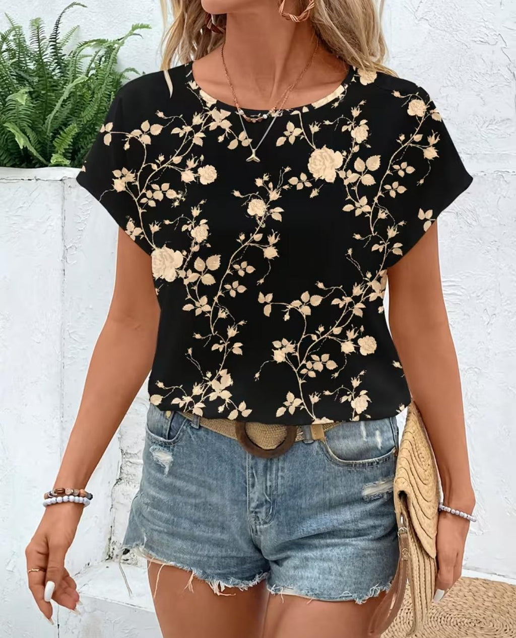 Blusa Rosalía negra con estampado floral