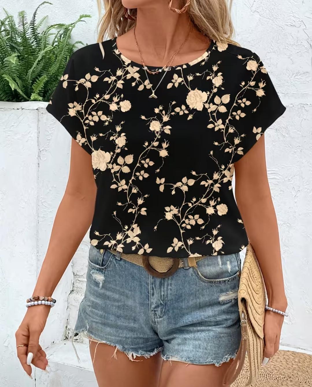 Blusa Rosalía negra con estampado floral