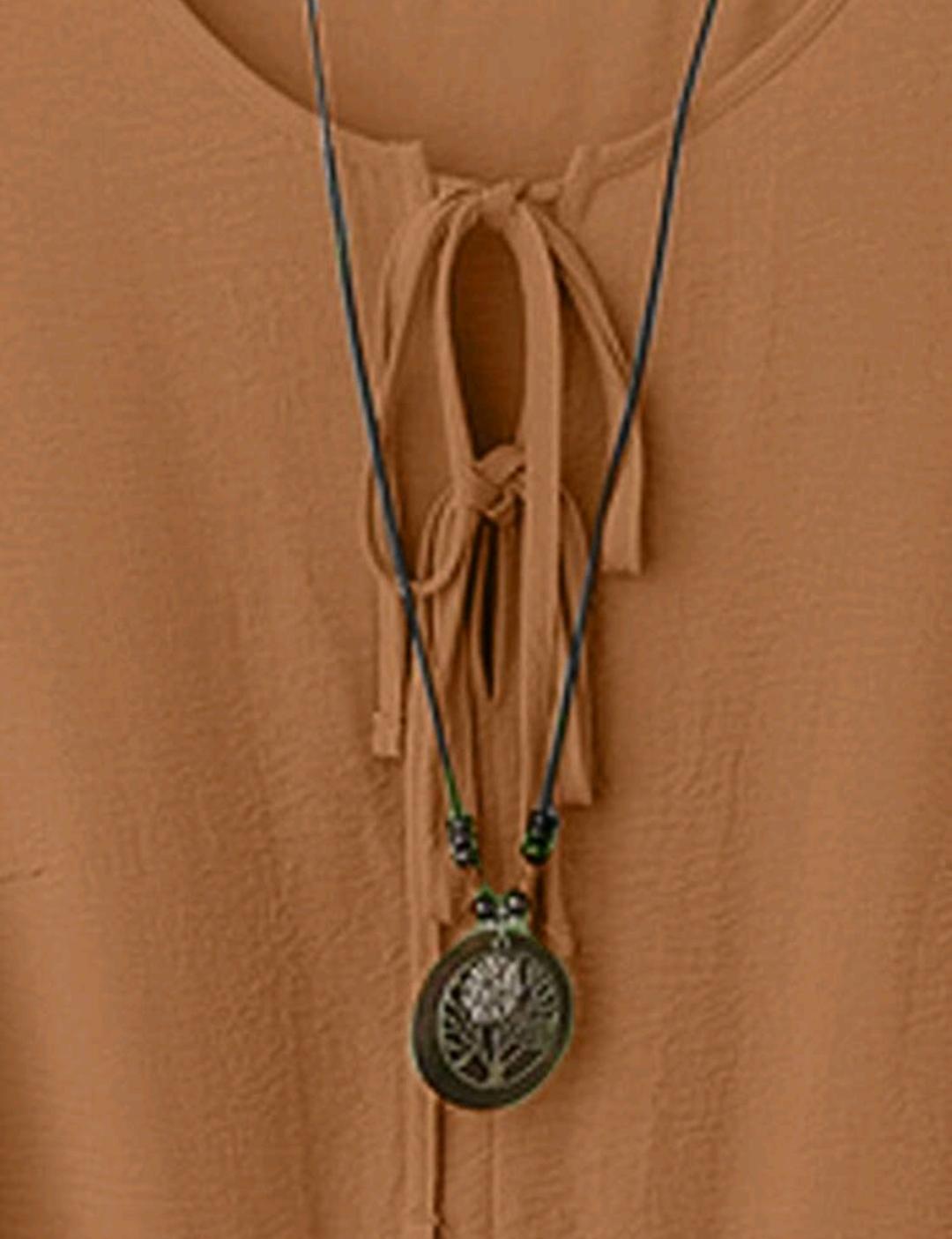 Linhara Conjunto informal de dos piezas de blusa con nudo delantero y pantalones anchos estampados para mujer de talla grande.