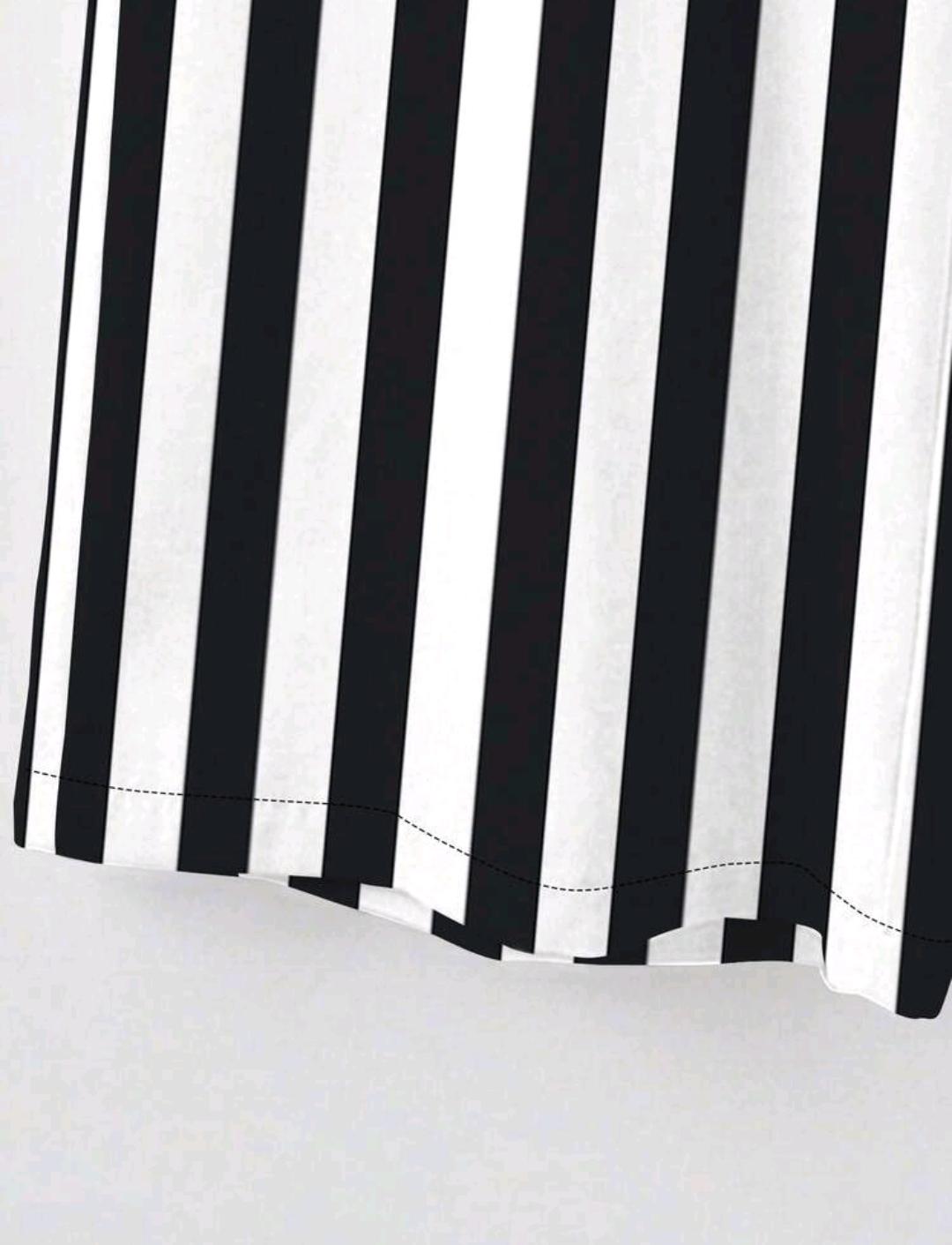 Conjunto casual de dos piezas incluye una blusa de talla grande de unicolor con cuello en V manga larga, y pantalones de pierna ancha estampados a rayas en blanco y negro.