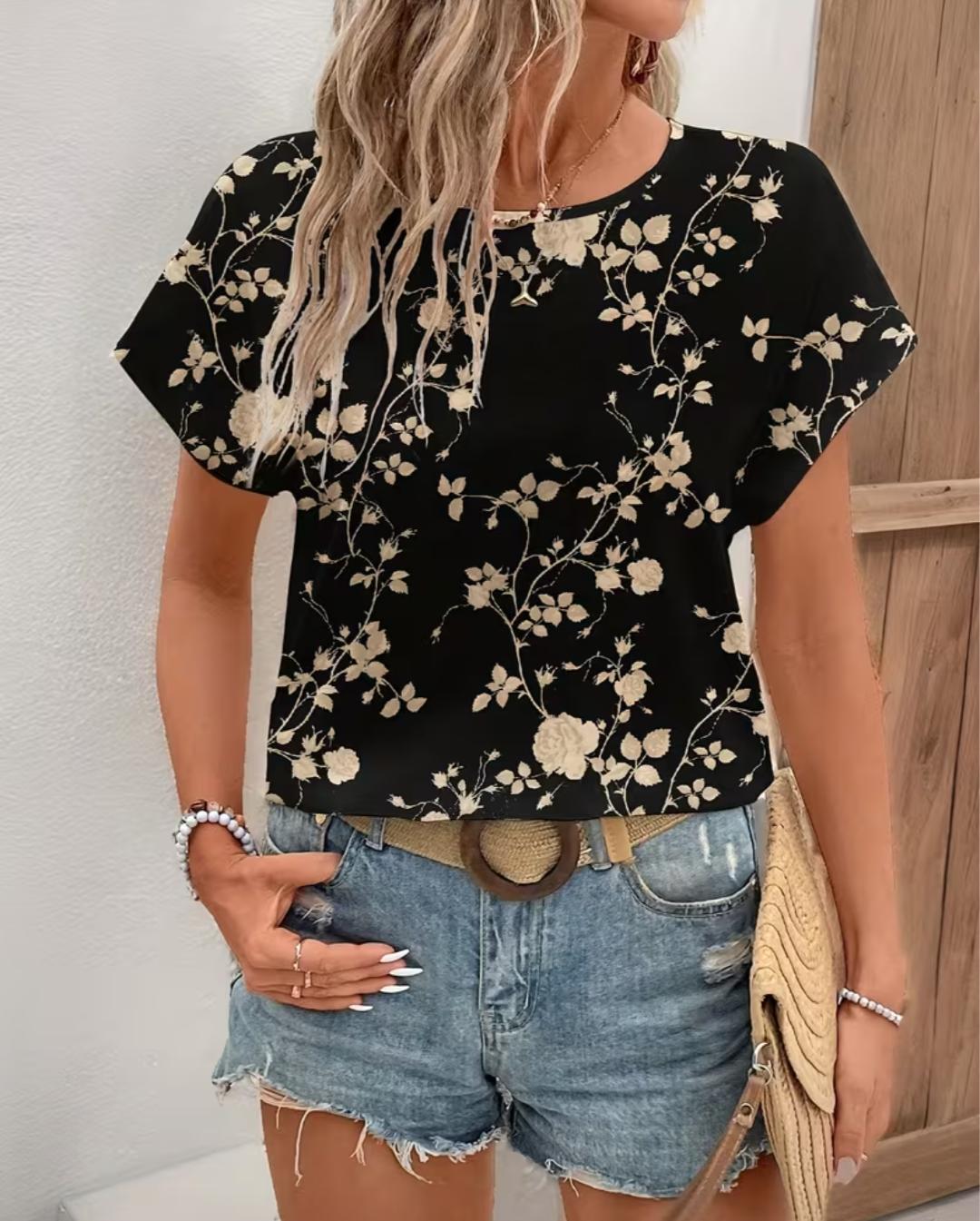 Blusa Rosalía negra con estampado floral