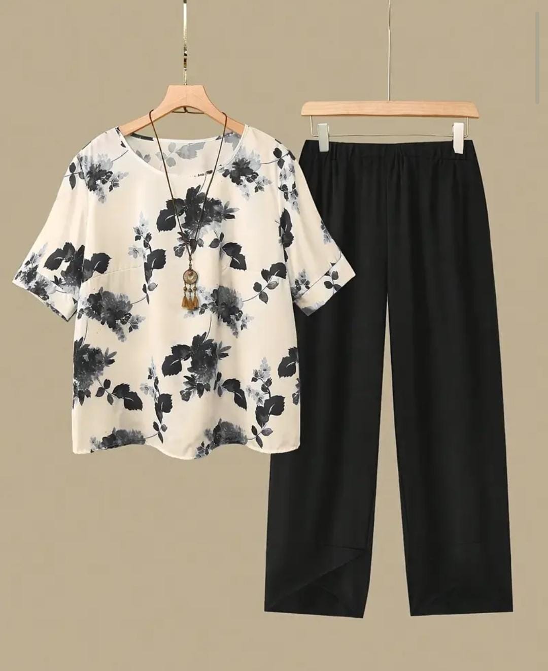 SHEIN Set de 2 piezas de mujer talla grande con Top estampado con flores y pantalones con cintura elástica y bajo asimétrico, para verano
