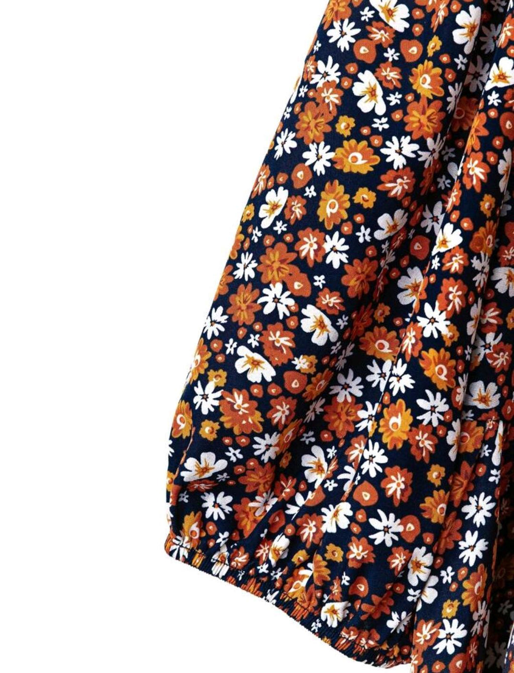 Conjunto de camisa casual con nudo delantero con estampado floral pequeño y pantalón de pierna ancha de un solo color para mujer de talla grande