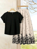 Conjunto de 2 piezas de falda estampado de flores + blusa unicolor.