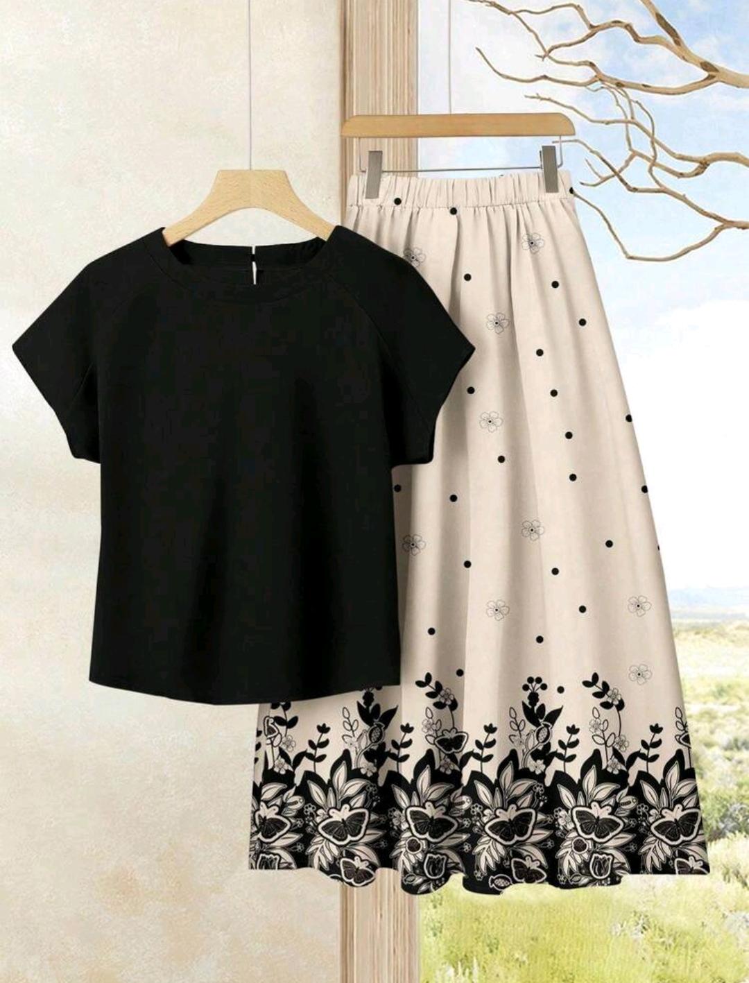 Conjunto de 2 piezas de falda estampado de flores + blusa unicolor.
